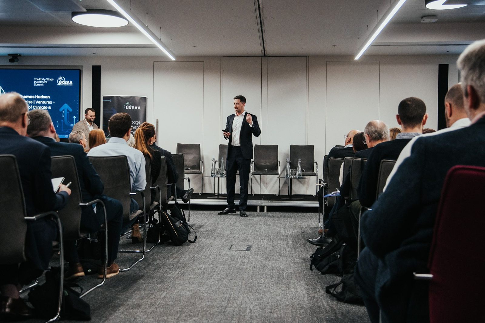 Thomas Hudson speaking to an audience of investors at the UKBAA Early-Stage Investor Summit