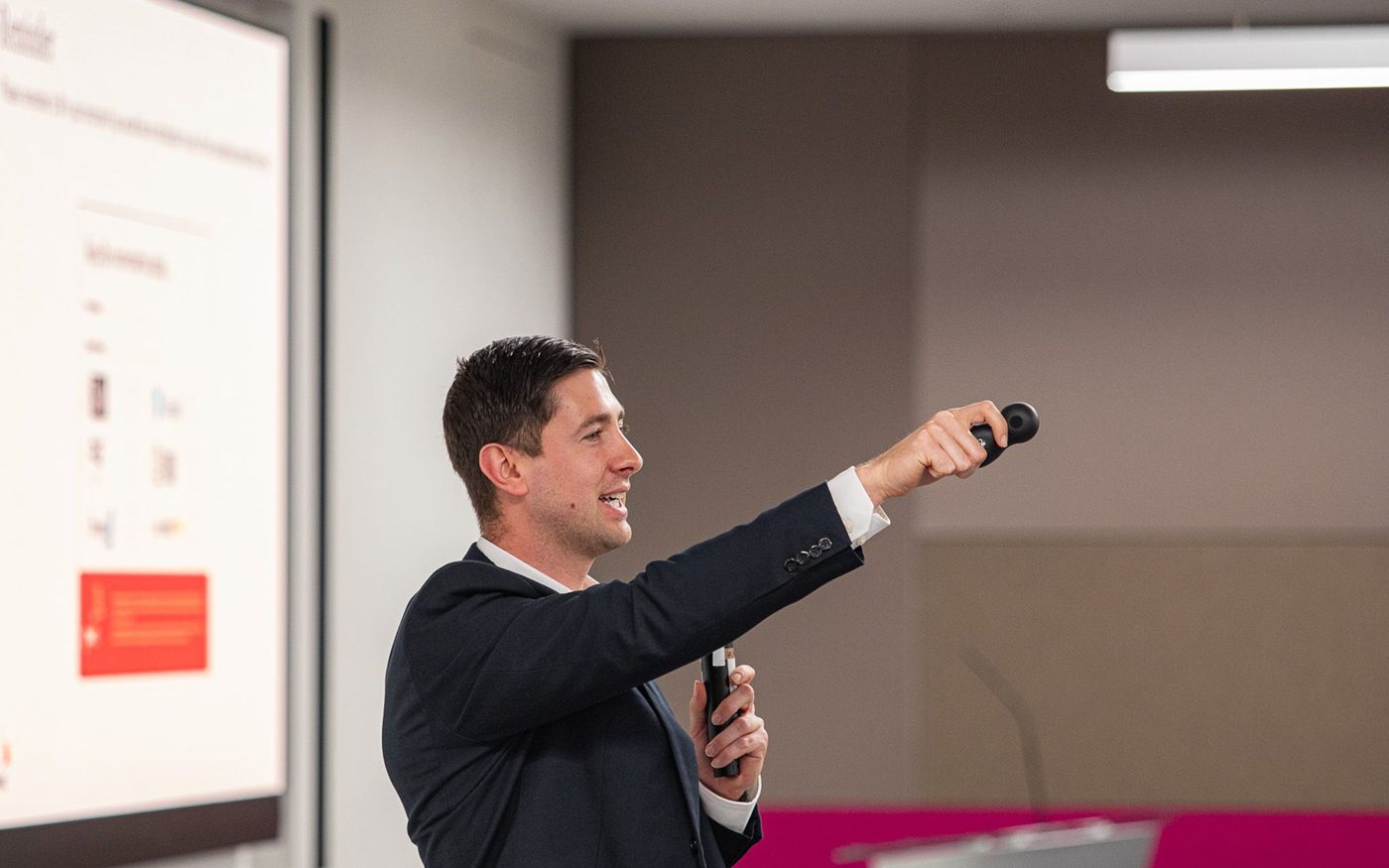 Thomas Hudson presenting at an industry event